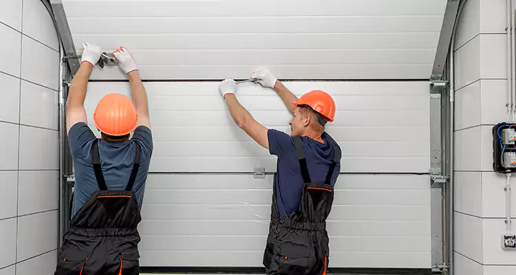 Garage Door Bottom Panel Repair in Oakleaf Plantation, FL